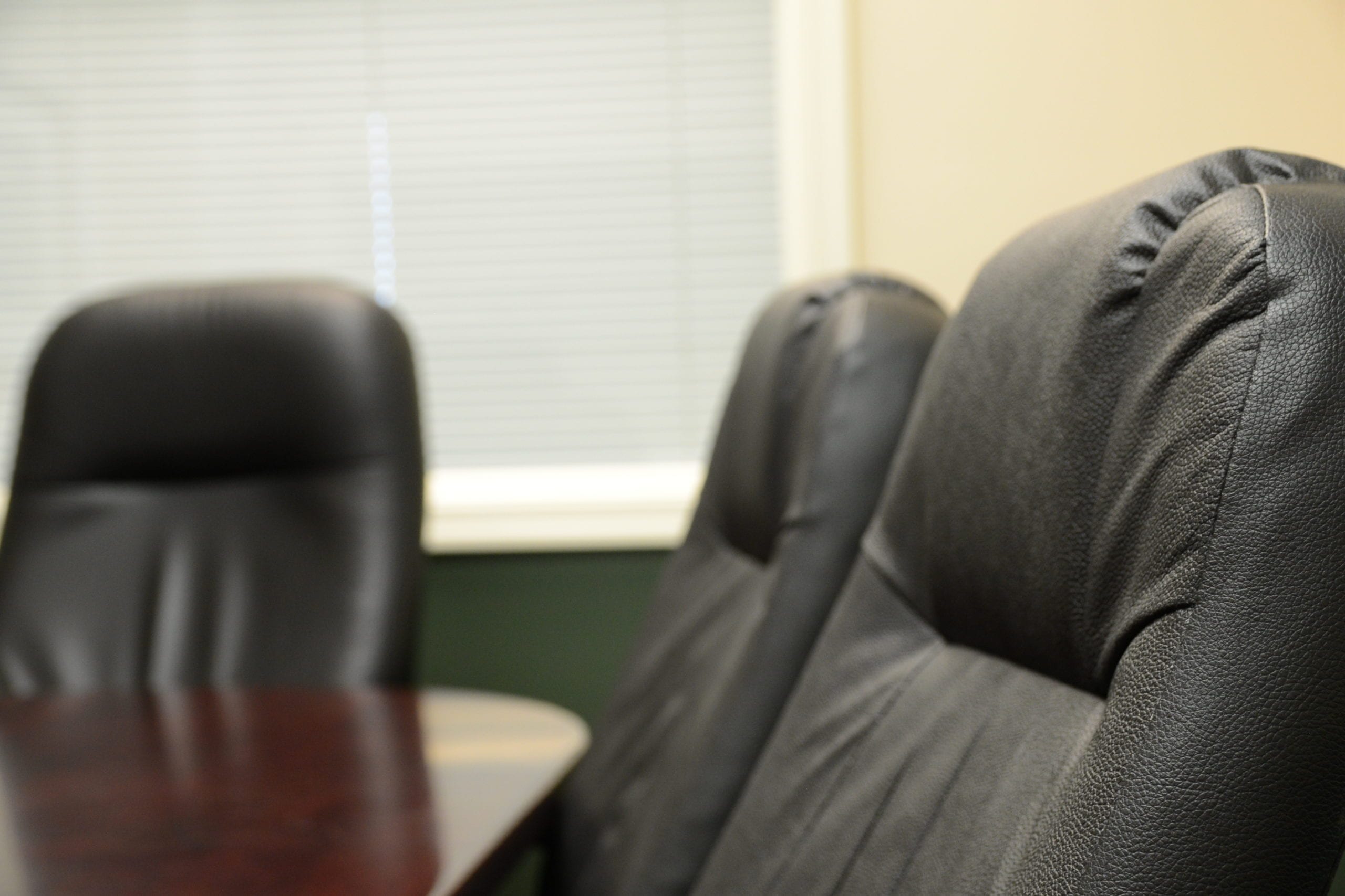 Professional advisor discussing mortgage options with clients
