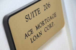 Advisor providing mortgage consultation to a client at a desk
